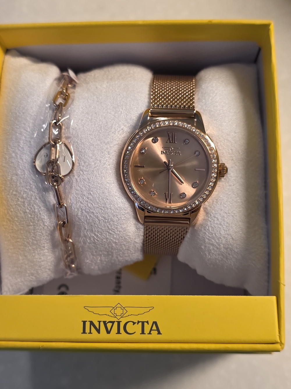 1.  Invicta Angel LadyWomen’s Rose Gold Mesh Watch With Matching Bracelet